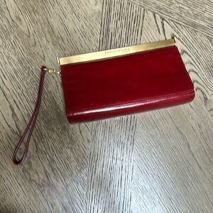 Kenneth Cole Genuine Leather burgundy wristlet